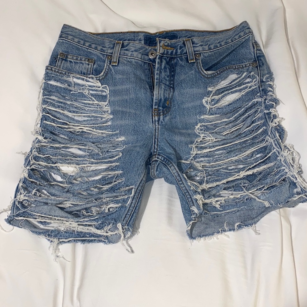 Distressed denim shorts